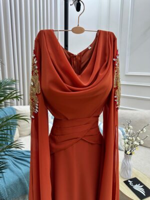 ⁦فستان سهرة لون برتقالي⁩ - الصورة ⁦2⁩