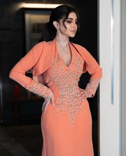 ⁦فستان سهرة لون برتقالي⁩ - الصورة ⁦2⁩
