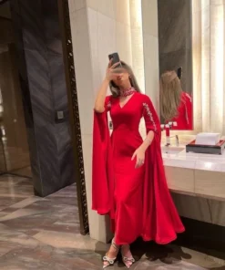 فساتين لون احمر ب اكمام طويلة