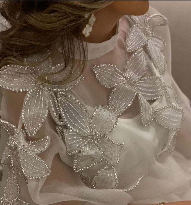 ⁦فستان سهرة أبيض⁩ - الصورة ⁦2⁩