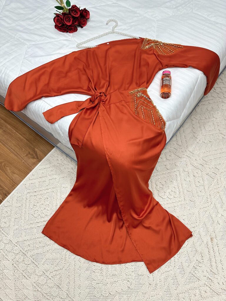⁦فستان سهرة لون برتقالي⁩ - الصورة ⁦3⁩
