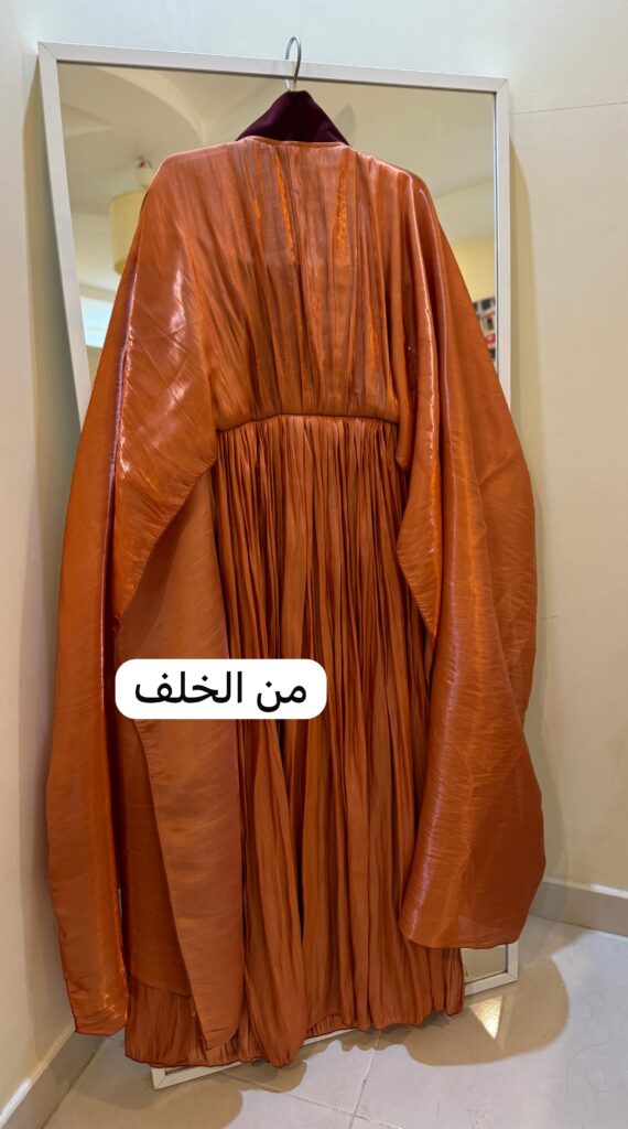 ⁦فستان سهرة لون برتقالي⁩ - الصورة ⁦6⁩
