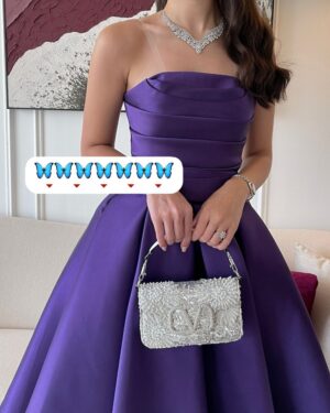 ⁦فستان سهرة بنفسجي أنيق بكتف مكشوف وقصة منفوشة⁩ - الصورة ⁦2⁩