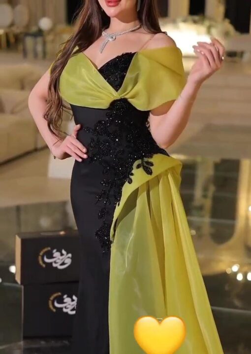 فستان نسائي فاخر باللون الأسود ولمسات ليمونية