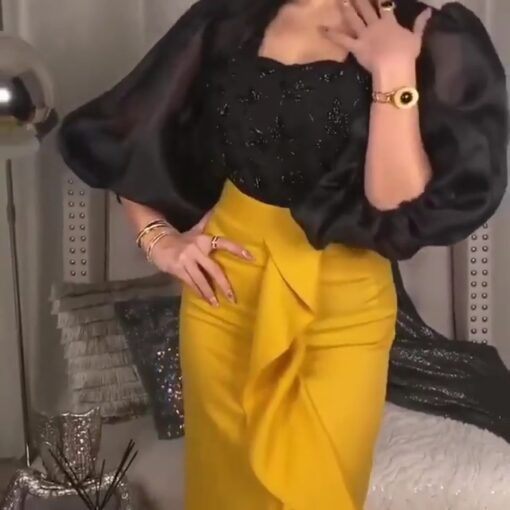 ⁦فستان سهرة فاخر بالأصفر: أناقة جريئة من التطريز الملكي"⁩ - الصورة ⁦6⁩