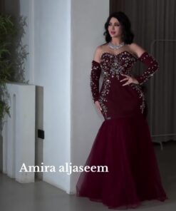 فساتين سهرة عنابية مطرزة لإطلالة ملكية فاخرة