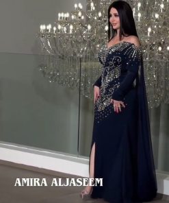 فستان سهرة كحلي مطرز بالكريستال الذهبي بأكمام طويلة