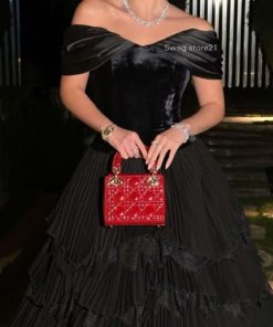 فستان سهرة أسود فاخر بطبقات كسرات أنيقة – متجر روزيتا السعودية