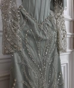 Alternative view of فستان سهرة زيتي فاخر مطرز بتصميم أوف شولدر وأكمام شفافة