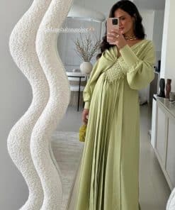 فستان حوامل أخضر باستيل بتصميم واسع وأنيق