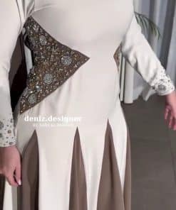 فستان سهرة أبيض أنيق بتصميم محتشم وراقي