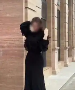 فستان سهرة أسود بكشكشة فاخرة وقصة حورية