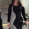 فستان سهرة أسود طويل مرصع بالكريستال وشراشيب جانبية