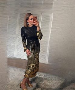 فستان سهرة أسود بتطريز ذهبي فاخر