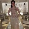 فستان سهرة شامبين طويل بكورسيه مرصع وتنورة شراشيب