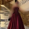فستان سهرة عنابي فاخر مرصع بالترتر والتنورة الواسعة