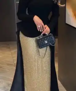 فساتين سهرة سوداء وذهبية بتصميم فاخر مع ذيل طويل