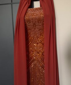 Alternative view of فستان سهرة نحاسي طويل بتصميم كاب رقيق وشراشيب مطرزة بالكامل بالكريستال البراق